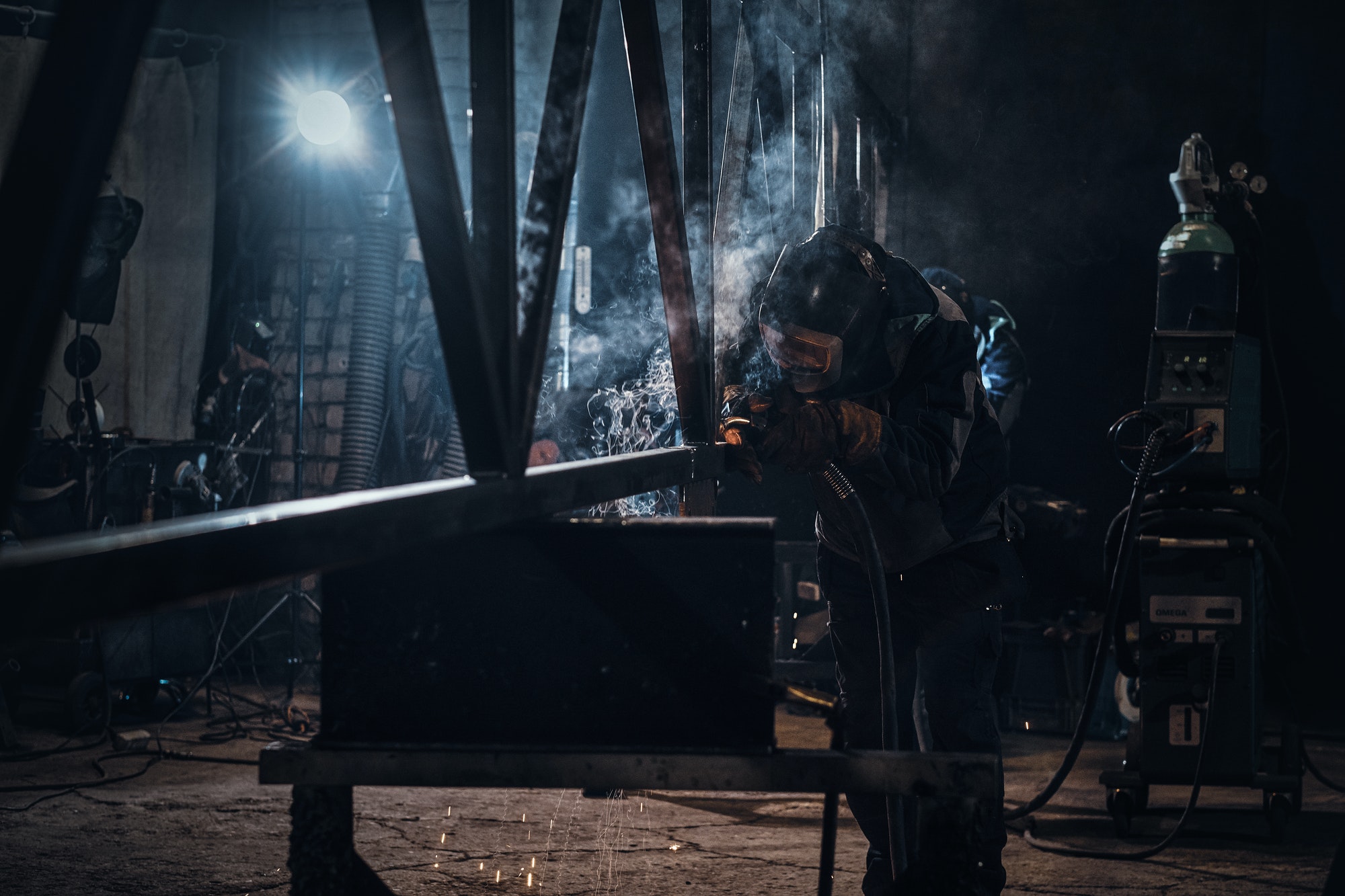 man-is-working-at-the-busy-metal-factory.jpg
