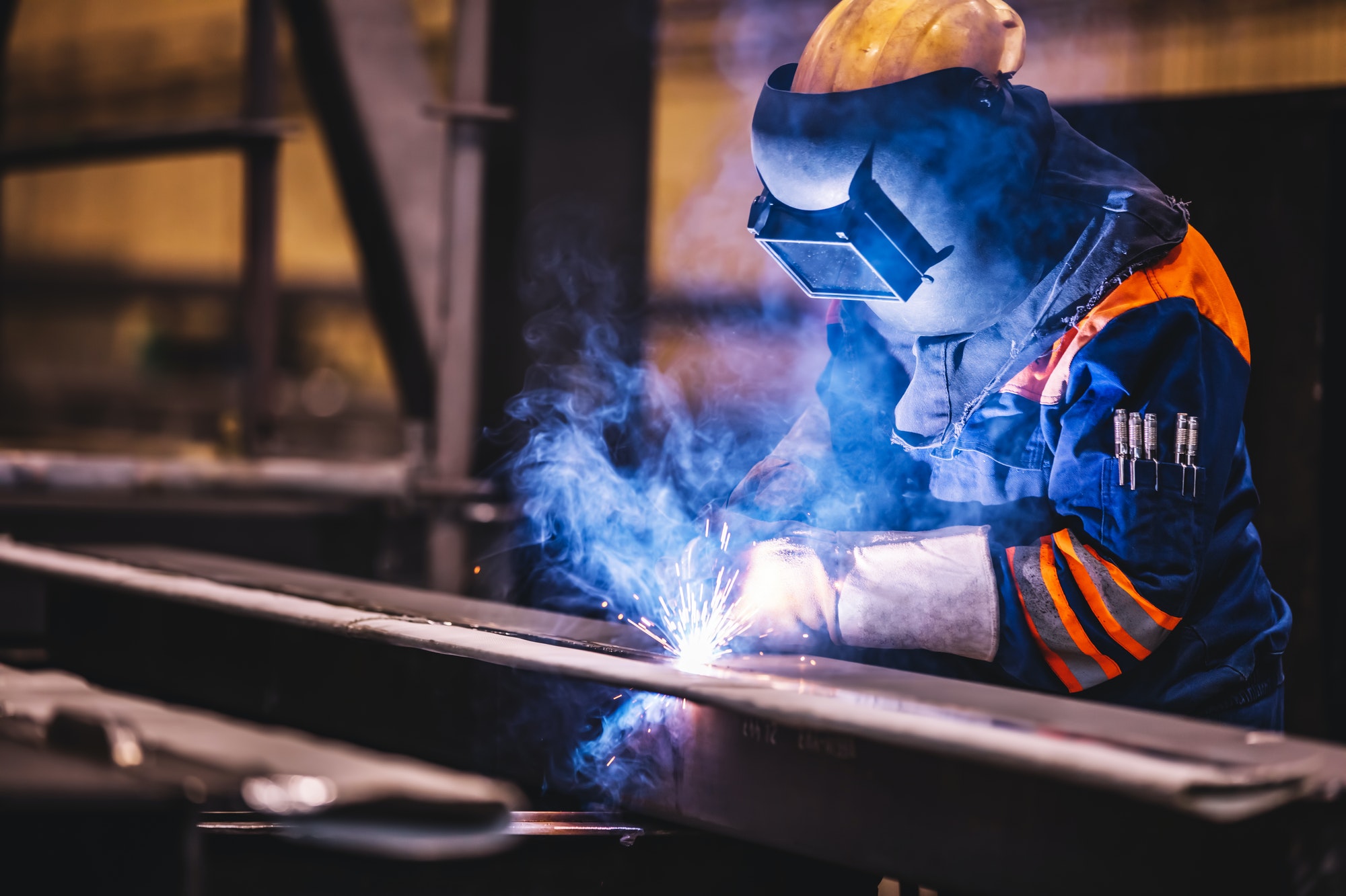worker-welding-in-a-factory-.jpg