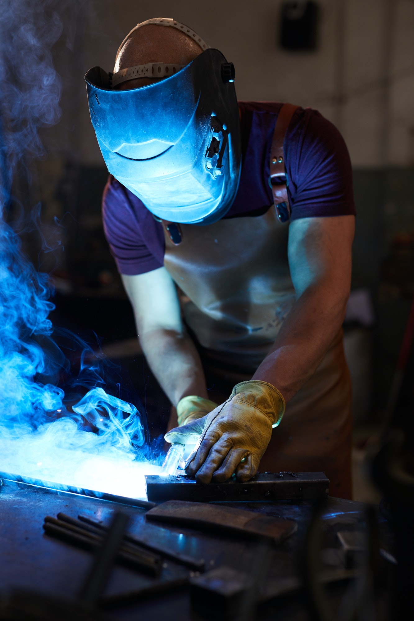 workman-welding-metal.jpg